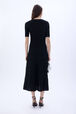 Long knit dress with short sleeves Black back worn view