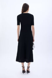 Long knit dress with short sleeves Black back worn view