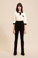 Women Ribbed Knit Flare Pants Black front worn view