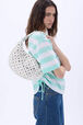 Medium Domino bag in leather and studs White front worn view