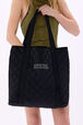 Quilted velvet tote bag Black back worn view