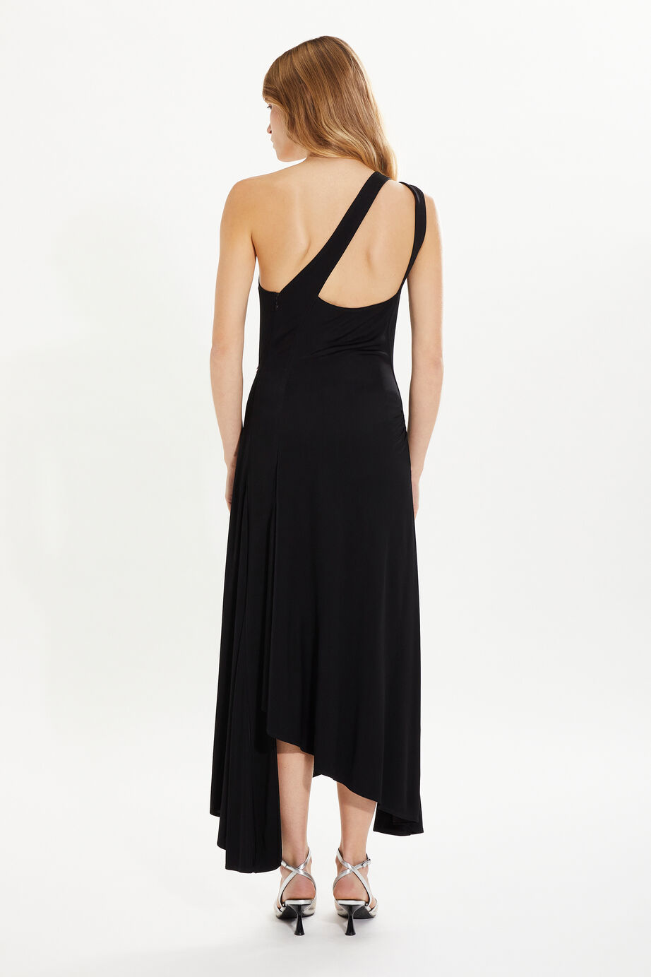 High resolution - Draped asymmetrical jersey dress Black back worn view High resolution - Draped asymmetrical jersey dress Black back worn view