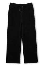 Black velvet pants Black front view