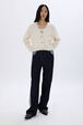 Cardigan torsadé en laine Ecru vue portée de face
