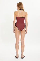 One-piece swimsuit Striped black/coral back worn view