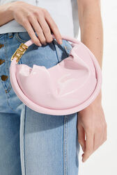 Domino mini vinyl bag Baby pink front worn view