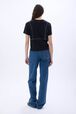 Pantalon en jean à côté en studs Bleu studs vue portée de dos