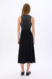 Asymmetrical skirt in jersey with studs Black back worn view