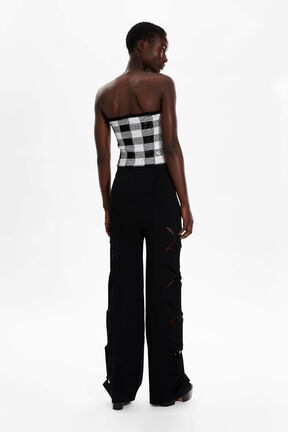 Women Openwork Floral Knit Trousers Black back worn view