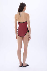One-piece swimsuit Striped black/coral back worn view
