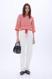 Pantalon en jean à côté en studs Blanc vue portée de face