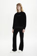 Women Velvet Flare Pants Black details view 1