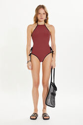 One-piece swimsuit Striped black/coral front worn view
