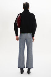 Turtleneck Jumper With Curved Long Sleeves Black back worn view