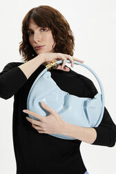 Domino medium vinyl bag Baby blue front worn view