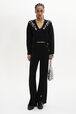 Flared Knit Wool Trousers with Rhinestone Motif Black front worn view