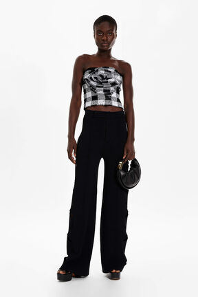 Women Openwork Floral Knit Trousers Black front worn view