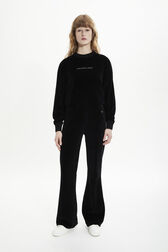 Women Velvet Flare Pants Black front worn view