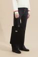 Women Heart Print Crochet Bag Black back worn view