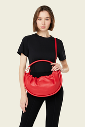Domino medium leather bag Red front worn view