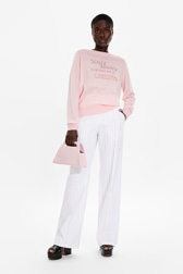 Women Rhinestone Quote Cotton Sweater Baby pink front worn view