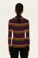 Women Maille - Women Stripped Sock Sweater, Multi icon fuchsia strip. back worn view