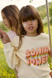 "Sonia Power" Print Girl T-shirt Light yellow front worn view